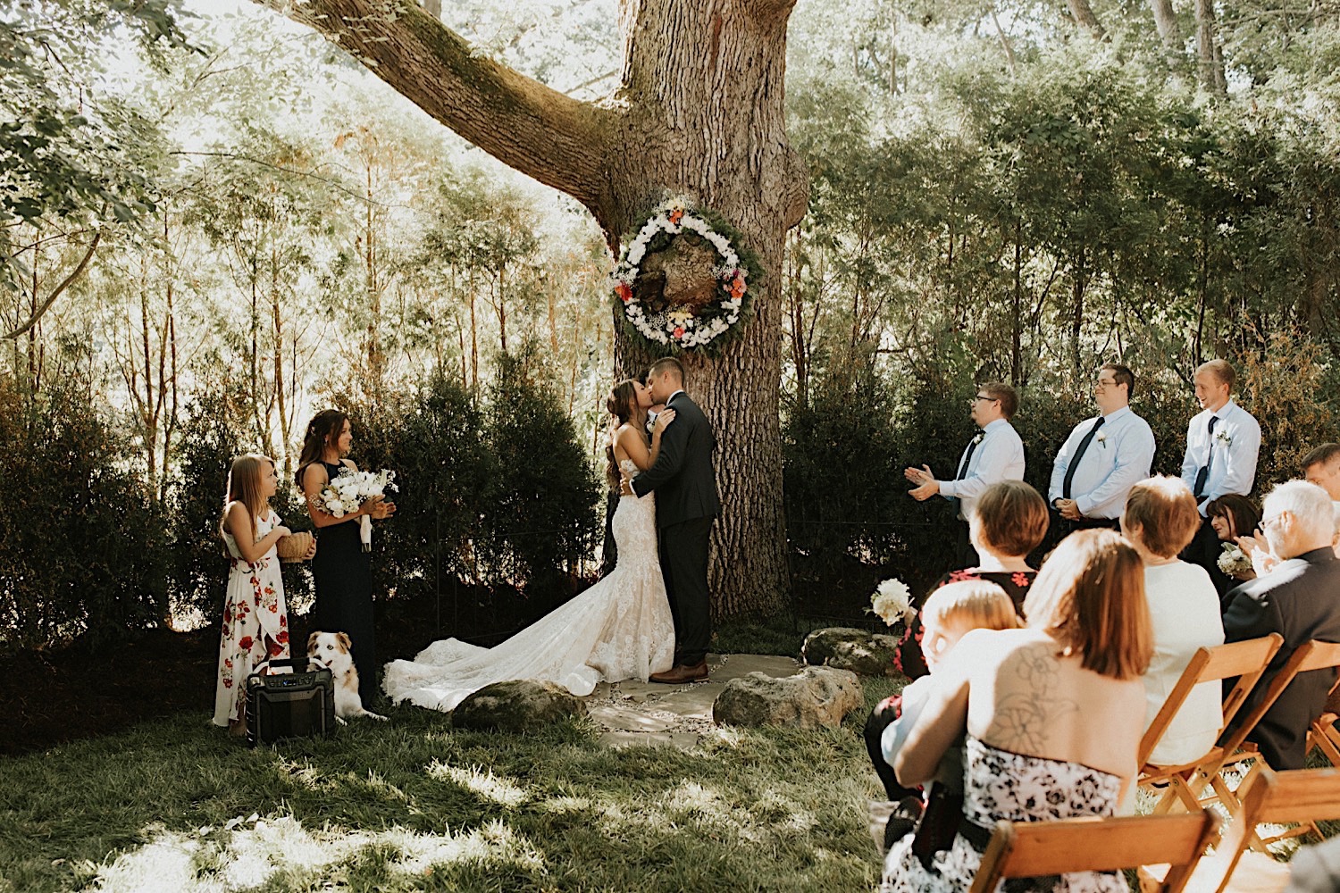 bride and groom kissing backyard wedding ann arbor