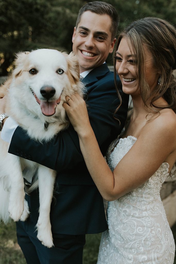 bride and groom with dog backyard wedding ann arbor michigan 