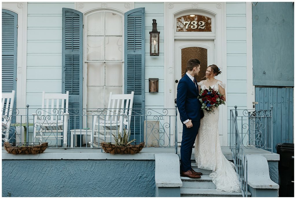 first look on a blue porch