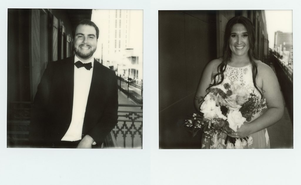 A bride and groom pose for portraits with the best instant film camera