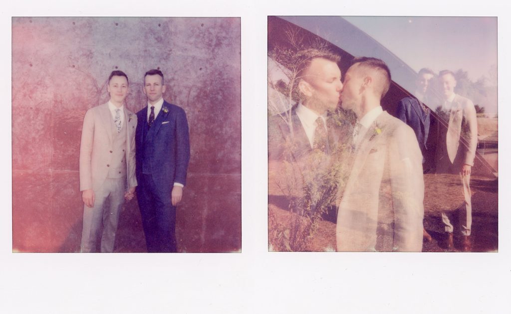 A couple kisses in front of a bride with the best instant film camera