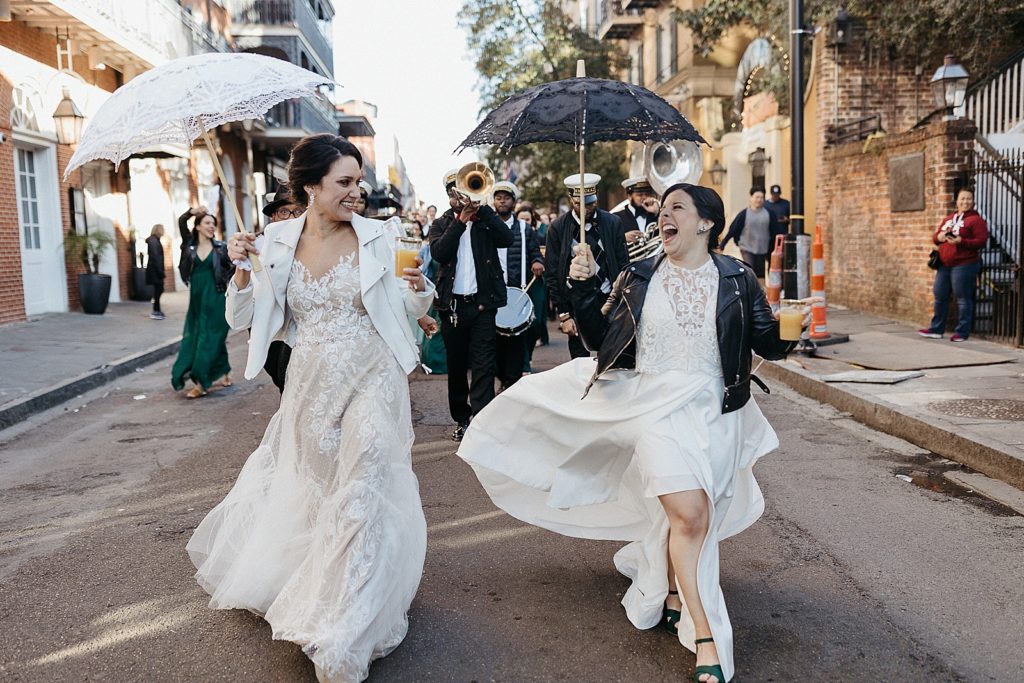 A bride's skirt twirls in the wind.