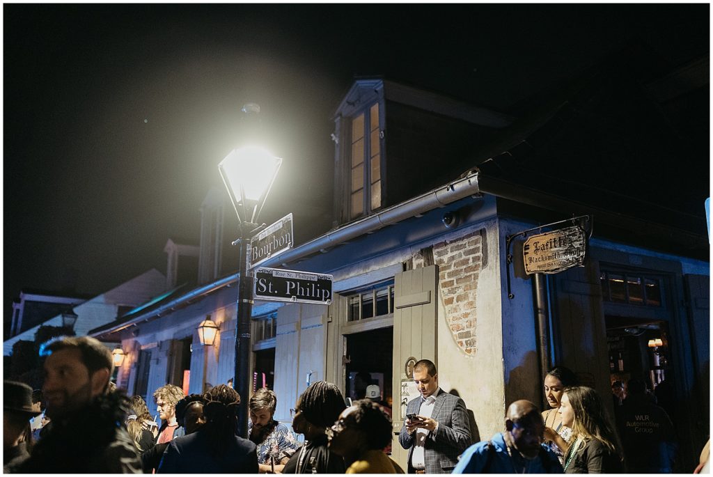 The New Orleans wedding parade stops at a bar.