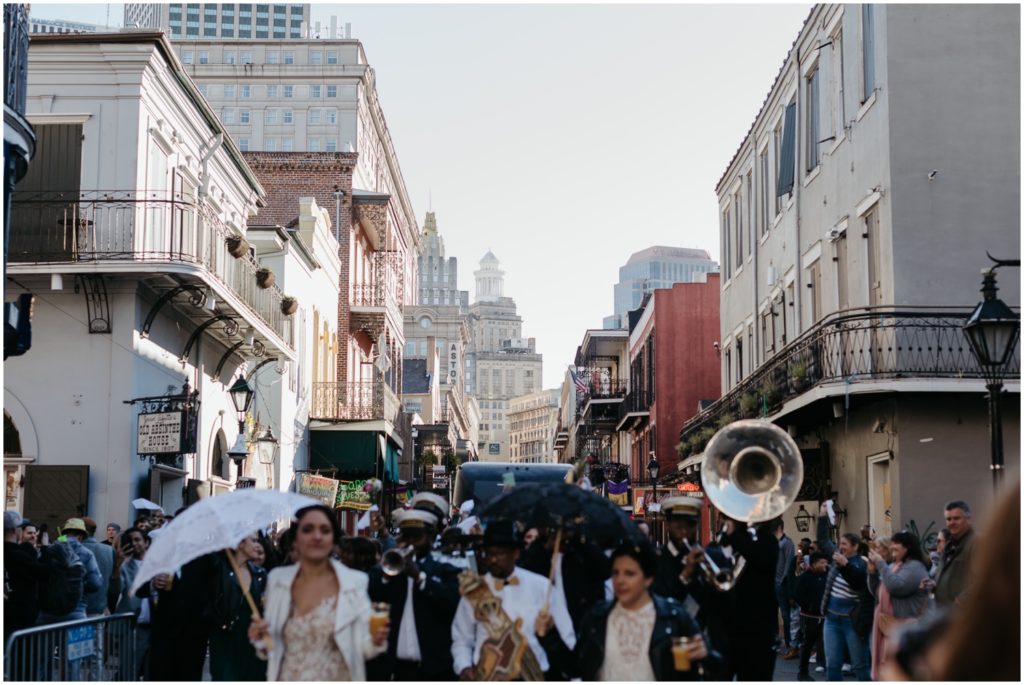 A New Orleans second line wanders through the French Quarter.