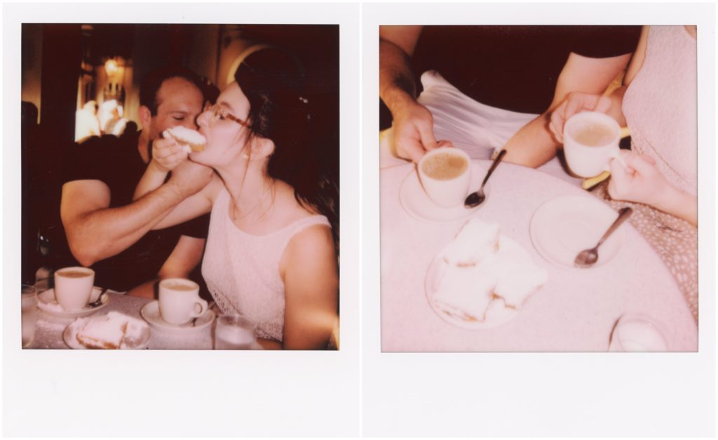 Eric feeds Lauren a beignet on their New Orleans honeymoon.