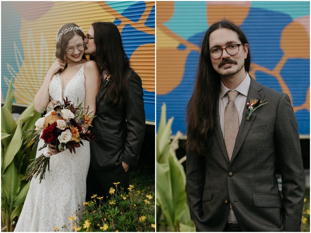 Penny and Jared lean against a mural before their winter garden wedding.
