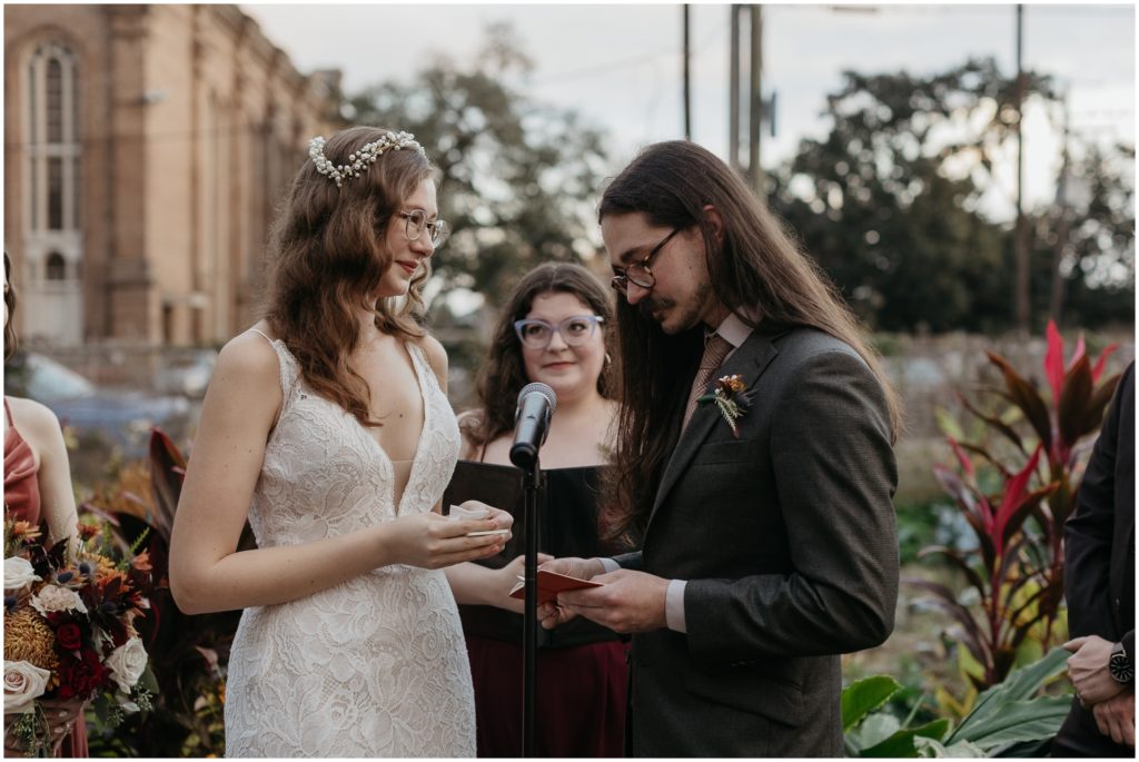 A groom reads his vows at a New Orleans wedding.