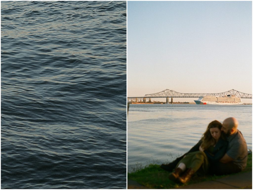 A ship passes by while Omar and Anastasia sit on the levee for New Orleans engagement photos.
